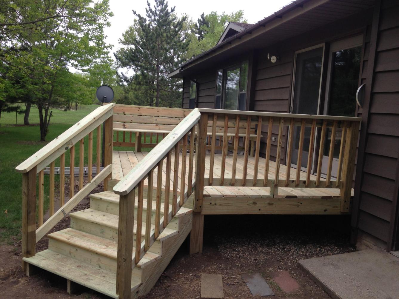 Custom deck building by Looman Construction in Minnesota Custom deck building by Looman Construction in Minnesota